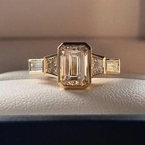 7x9mm <b>Emerald</b> Cut Moissanite Engagement <b>Ring</b> Bezel Set Three Stone Yellow Gold Plated 925 <b>Silver</b> Fine Jewelry Wholesale - Product Image 1