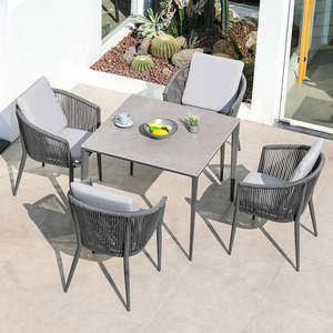 Modern <b>Rattan</b> Eco-Friendly Outdoor Dining <b>Table</b> Set with Waterproof Cushions Rope Chairs | Horticlub for Hotel & Living Room Use - Product Image 1