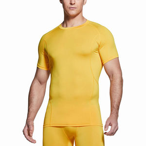 Protège-éruptions cutanées fabriqué au Pakistan en Polyester Spandex couleur jaune manches Raglan chemises de Compression extensibles - Product Image 1