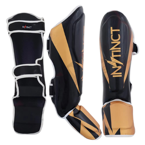 Instinct, venta al por mayor, espinilleras acolchadas de PU ajustables duraderas profesionales para Muay Thai Kick Boxing Training All Seasons - Product Image 1