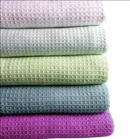 100% coton jette des tissages personnalisés gaufré Jacquard hareng os thermique sans accroc Leno tisse couleurs tailles poids en vrac