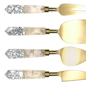 Nouveau design d'épandeur de trancheuse à fromage à lame plaquée or en acier inoxydable à manche en marbre Design antique d'épandeur de fromage - Product Image 1