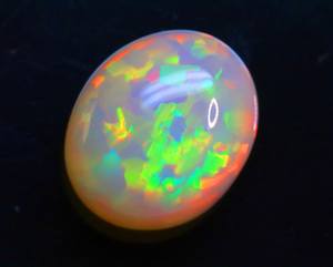 Piedra preciosa de cabujón suelto de ópalo etíope AAA +++-Gemas de ópalo de forma ovalada Welo Play Of Fire-Piedra brillante pulida suave para joyería - Product Image 1