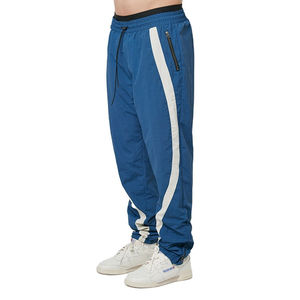 Pantalones de chándal de cintura elástica de secado rápido impermeables de poliéster ligero para hombre 2025, entrenamiento de bloque de Color con bolsillo y cremallera personalizado - Product Image 2
