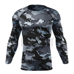 Conception personnalisée MMA Rash Guard imprimé par sublimation Bonne qualité Prix compétitif Nouvelle arrivée Couleur unie Hommes Fitness Rash Guards - Product Image 1