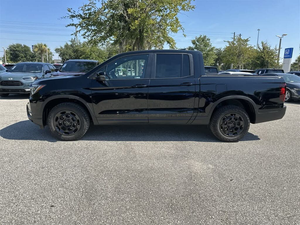 Honda Ridgeline Trail-Sport AWD 2024 d'occasion noire avec jantes en alliage foncées, sièges en cuir, transmission automatique, navigation, sièges chauffants et télécommande - Product Image 5