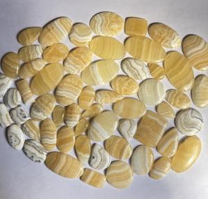 Vente en gros de cabochon ovale en calcite jaune de taille personnalisée pierre précieuse en cristal de calcite jaune naturelle pour bijoux polis pierres précieuses en vrac - Product Image 1