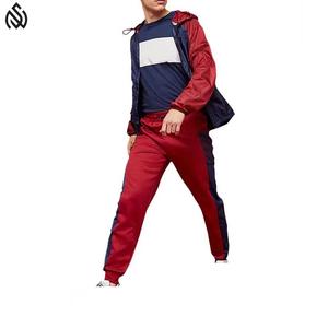 2025 ensemble de survêtements coupe-vent élégants de qualité supérieure noir avec logo personnalisé broderie Patch survêtements - Product Image 1