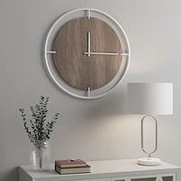 Horloge murale en fer unique pour la décoration intérieure design, ajoutant un caractère distinctif au style des murs intérieurs