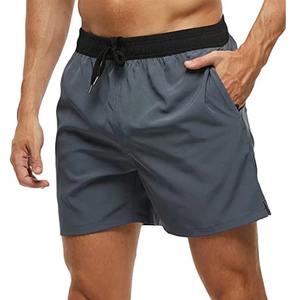 Pantalones cortos de playa informales de estilo sólido para hombre, bañadores de secado rápido con cierre elástico y bolsillos con cremallera, ropa de playa a la moda - Product Image 1