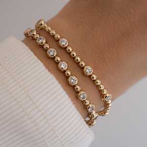 Pulsera de diamantes de circonita cúbica de tenis con ajuste de bisel de corte redondo de lujo chapado en oro de Plata de Ley 925 al por mayor para mujer - Product Image 4