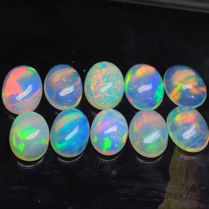 Piedra preciosa de cabujón de forma ovalada de ópalo etíope natural-Gemas llamativas de arcoíris de alto grado-Cabinas sueltas suaves para la fabricación de joyas - Product Image 1