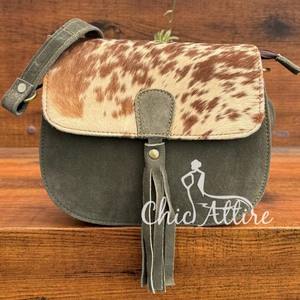 Nouveau design de gros de sacs à bandoulière haut de gamme en cuir suédé véritable avec pompon pour femmes sacs à main à bandoulière en cuir de vachette - Product Image 1