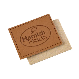 ป้ายโลโก้แบบนูน แบรนด์พรีเมียม สำหรับเสื้อผ้าและเครื่องแต่งกาย ขายส่ง - Product Image 1