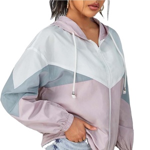 Chaqueta cortavientos de nailon con Capucha ligera personalizada 2025 para mujer, tela de poliéster impermeable de alta calidad, soporte de algodón para correr - Product Image 1