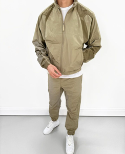 Ensemble 2 pièces patchwork à ourlet élastique survêtement survêtement coupe-vent d'entraînement à blocs de couleurs vente en gros - Product Image 4