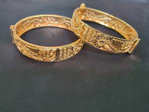 Buy <b>Bangles</b> with 22CT <b>Gold</b> <b>Plated</b> Round Shaped Trendy Designed <b>Bangles</b> Set for Women Fashionable Wear <b>Bangles</b> - Product Image 2