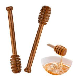 กระบวยน้ำผึ้งทำจากไม้เกรดอาหารที่มีด้ามยาวและดีไซน์ร่องเพื่อการเสิร์ฟและกระจายน้ำผึ้งที่สมบูรณ์แบบ - Product Image 1