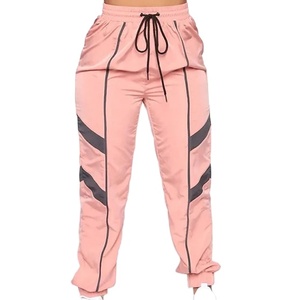 ชุดกันลมสำหรับผู้หญิงเสื้อกันลมมีซิปผ้าโพลีเอสเตอร์สองชิ้นกางเกงและแจ็กเก็ตไนลอน - Product Image 4