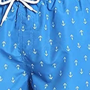 กางเกงขาสั้นชายหาดผ้าซาตินสีน้ำเงินสำหรับผู้ชายชุดสไตล์สตรีทผ้าฝ้าย100% ระบายอากาศได้เป็นมิตรกับสิ่งแวดล้อมลายทึบขนาดกลางราคาสมเหตุสมผล - Product Image 5