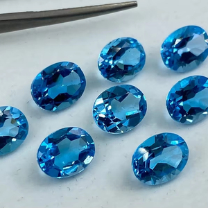 พลอยโทแพซสีฟ้าธรรมชาติคุณภาพสูงพิเศษ รูปทรงวงรี ขนาด 6 มม.-8 มม. น้ำหนัก 2 กะรัต ผ่านการเคลือบแว็กซ์/น้ำมัน ทำด้วยมือ - Product Image 1