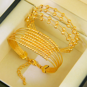 Ensemble de bijoux de mariage tendance plaqué or 21 carats, bracelet et bague multicouches au design dorique pour femme, idéal pour les événements et les fêtes - Product Image 5