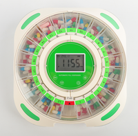 Distributeur automatique de pilules avec gobelets amovibles, 21 compartiments, 9 anneaux de dosage, rappel par alarme, écran LCD, alertes sonores et lumineuses