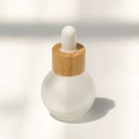 Flacon compte-gouttes sphérique de 20ml 30ml 50ml avec couvercle en bambou fond rond et épais petit flacon de voyage à ampoule pour huile essentielle