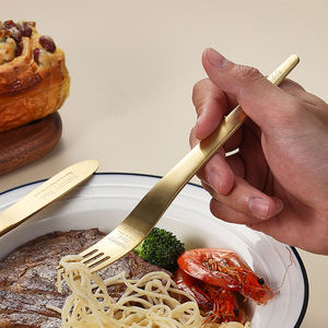 Elegant golden stainless steel <b>flatware</b> <b>set</b> suitable for home kitchen restaurant hotel dining and daily meal presentation - Product Image 1