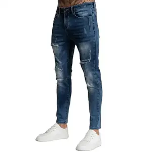 Jeans pria kebesaran sobek, ukuran besar Logo kustom bertumpuk longgar kaki lebar kancing jalanan untuk pria