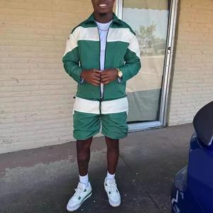 Chándales de moda con logotipo personalizado para ropa de invierno 100% poliéster Color sólido hombres chándal cortavientos conjuntos hombres manga larga - Product Image 1