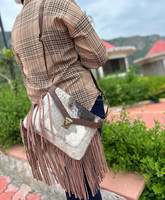 Nouveau Style occidental cheveux sur cacher fourrure en cuir véritable frange sacs haute qualité Boho Style femmes en cuir véritable frange sacs à bandoulière