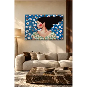Impression sur toile Fida avec fond bleu, fleurs blanches et cheveux ébouriffés par le vent - Product Image 4