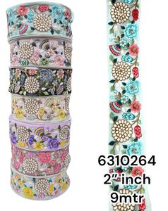 Rubans et lacets brodés à la machine sur mesure dans divers modèles et en sept couleurs pour les robes de mariée sur tissu net. - Product Image 5