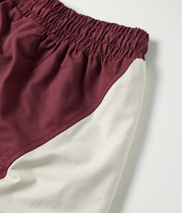 2025 nuevo diseño de chaquetas universitarias para hombres logotipo personalizado tela de satén cortavientos conjunto de pantalones cortos moda calle Jogger ropa deportiva invierno - Product Image 4