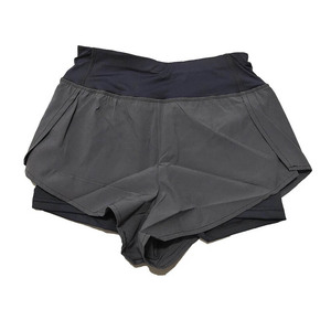 Pantalones cortos de yoga transpirables de cintura alta para mujer Venta al por mayor Pantalones cortos de entrenamiento de gimnasio sin costuras de cintura media Diseño de patrón sólido - Product Image 1