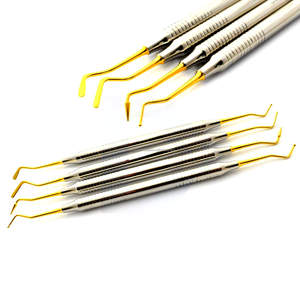 Kit de Instrumentos dentales compuestos, herramientas manuales de llenado de Punta dorada, manijas huecas, aplicadores de enchufes de acero inoxidable, CE ergonómico - Product Image 1