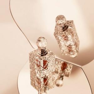 Calidez y elegancia: descubre el atractivo del aceite de Oud natural en velas perfumadas - Product Image 2