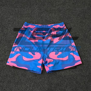 Pantalones cortos de doble capa Microstretch MMA con logotipo personalizado, ropa deportiva unisex con impresión por sublimación, fabricados en Pakistán - Product Image 1