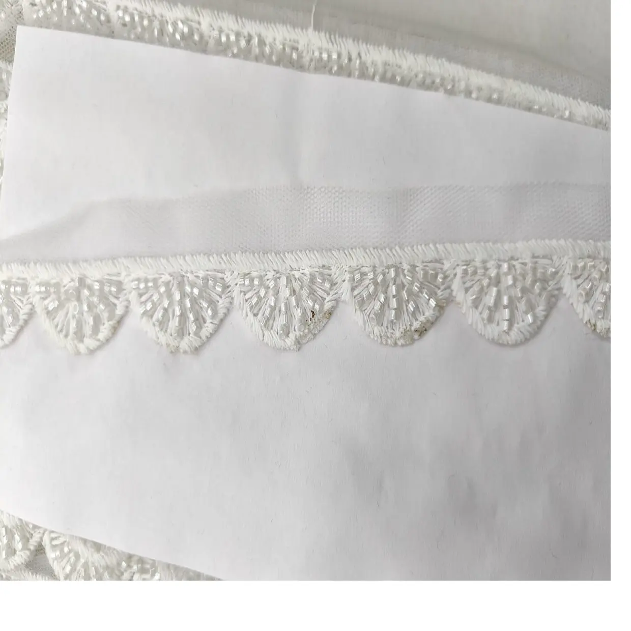 custom made in scalaping designed machine embroidered laces in various designs & in white colours for wedding dresses