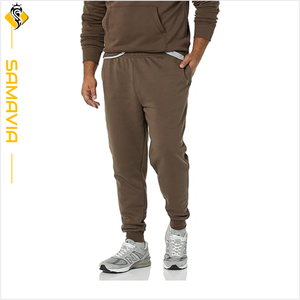 Stock disponible pantalons pour hommes avec poches tricotées taille élastique logo personnalisé pantalons de survêtement imperméables respirants coupe-vent OEM - Product Image 4