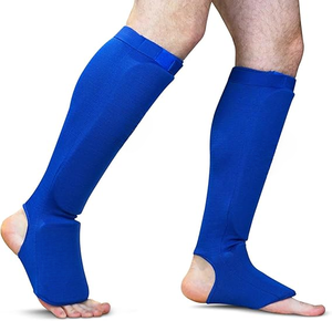 Espinilleras profesionales de diseño personalizado de alta calidad para Muay Thai Kickboxing Taekwondo Karate Boxing Venta al por mayor Espinilleras de cuero - Product Image 1