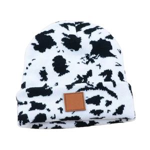 Winter High Quality Warm Soft Western Style Leather Patch Designer Cow <b>Leopard</b> <b>Print</b> Knitted Beanies <b>Hats</b> Custom logo - Product Image 1