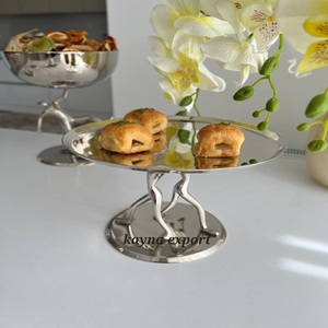 Cuenco para servir comida con soporte de escultura humana pulida brillante de acero inoxidable - Product Image 1