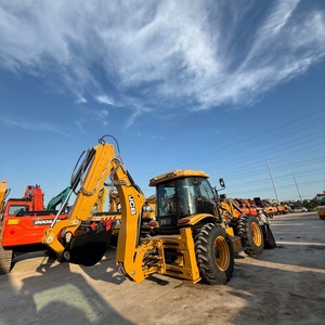 รถตักล้อยาง JCB 4CX สภาพใหม่ 95% พร้อมประสิทธิภาพที่เชื่อถือได้ รถตักล้อยาง JCB 4CX มือสอง เครื่องจักรก่อสร้าง มีสินค้าในสต็อก - Product Image 1