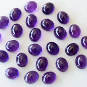 Cabujones calibrados sueltos semipreciosos ovalados lisos de amatista Natural de 4mm y 5mm precio al por mayor piedras fabricación de joyas comprar en línea - Product Image 1