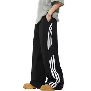 Pantalon de survêtement droit décontracté et sportif pour hommes Pantalon en nylon unisexe à séchage rapide à rayures Taille élastique brodée Service OEM - Product Image 2