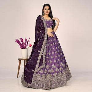 Lehenga Choli brodé de luxe avec des détails de motifs élégants sur toute la surface, un travail de bordure riche et un dupatta doux et fluide - Product Image 4