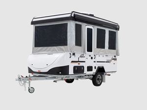 Caravane de luxe pour le camping, dotée d'un lit queen size, d'un coin repas en cuir et d'une salle de bain complète pour les voyageurs. - Product Image 4
