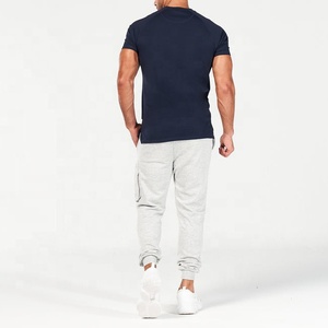 Logo personnalisé pour hommes T-shirt de sport coupe ajustée Vêtements de sport secs Tissu tricoté à manches courtes Vente en gros de vêtements de sport personnalisés pour tous - Product Image 5
